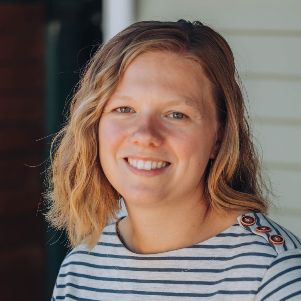 A woman smiling